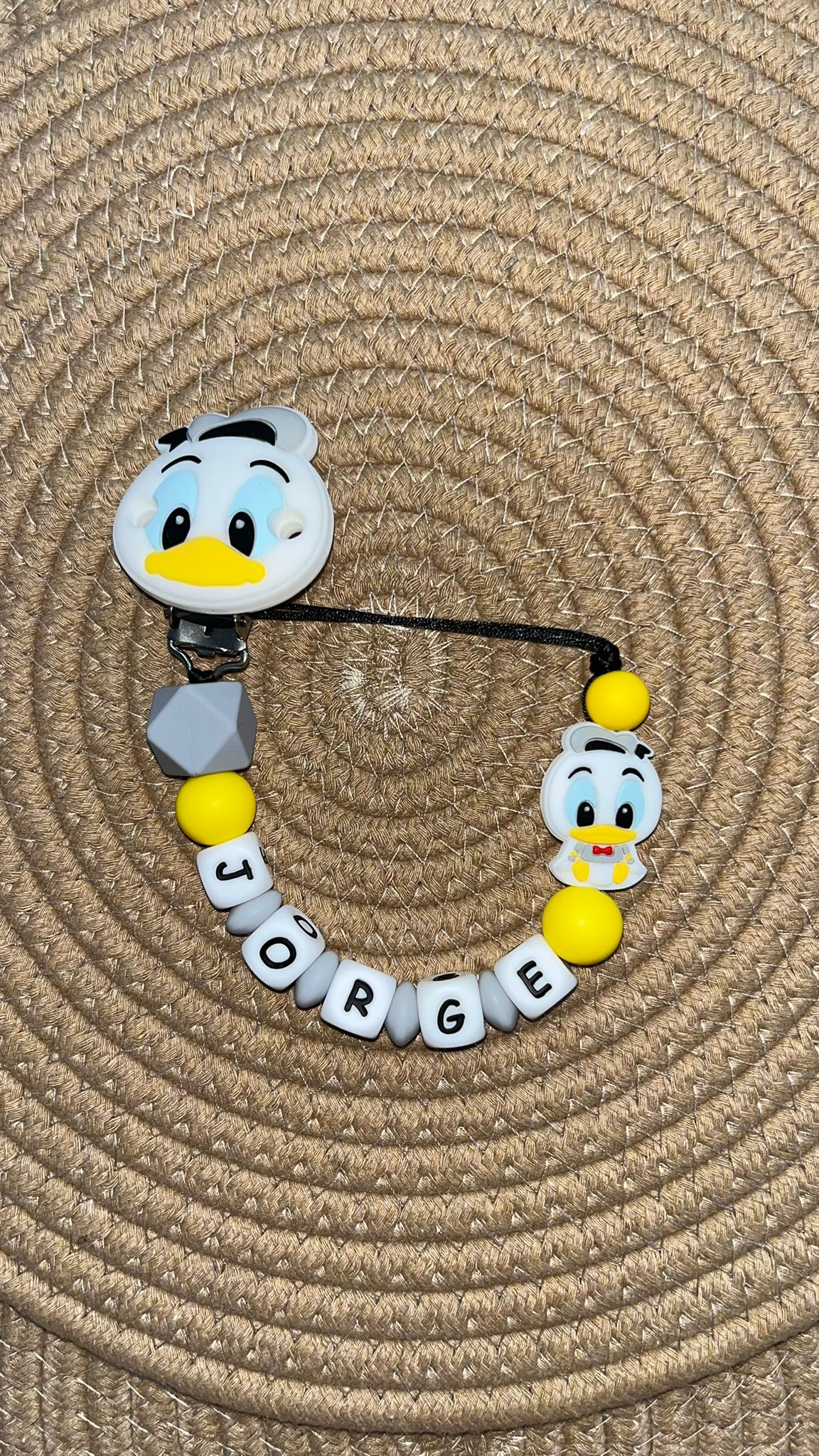 Chupetero con clip y abalorio a juego